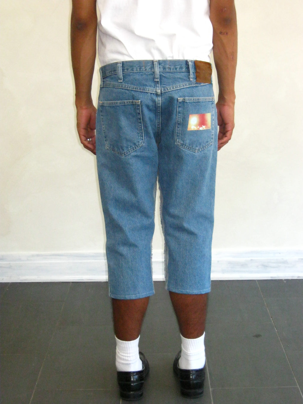 Jean en jean délavé, coupe 3/4, style workwear, de marque Lee, vintage